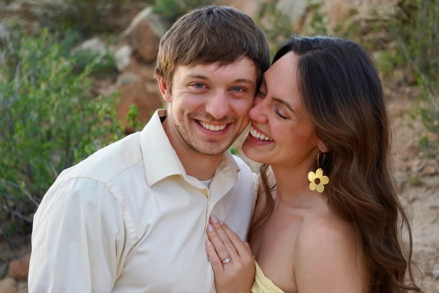 Couple laughing together in warm natural light, Fort Collins portrait photography